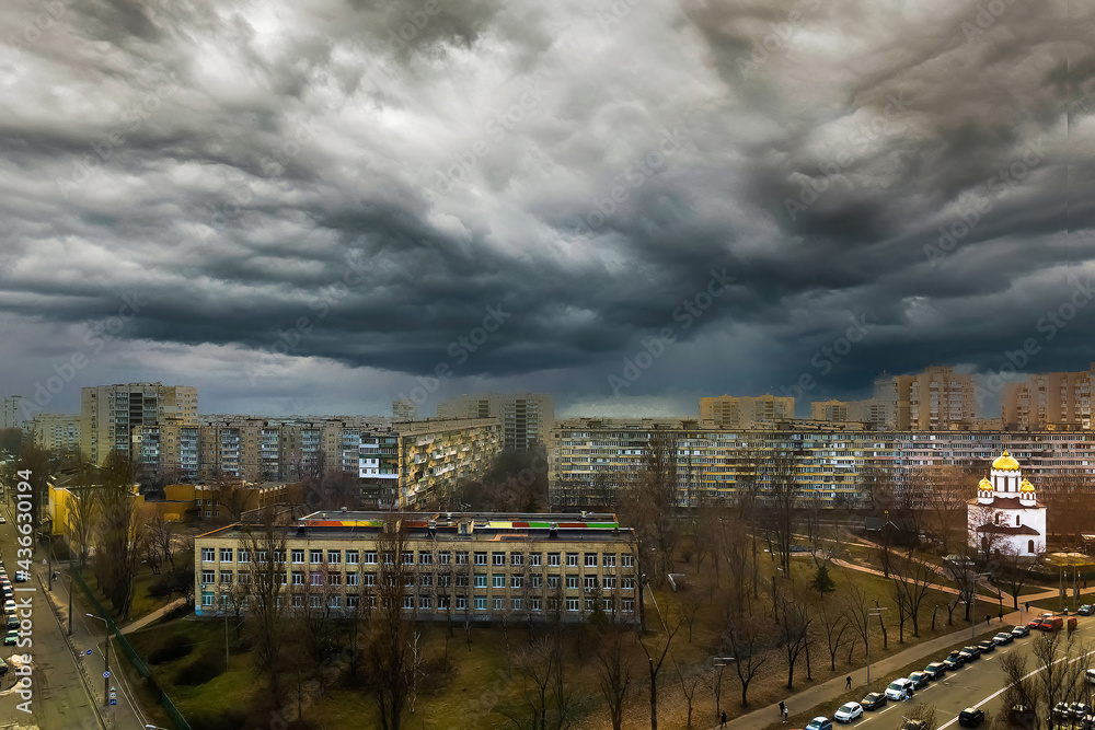 Apocalyptic cityscape with stormy skies and impending storm