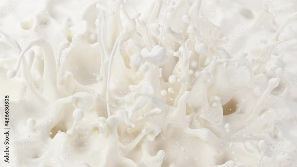 Super Slow Motion Shot of Pouring and Splashing Fresh Milk at 1000 fps. Super Slow Motion Shot of Pouring and Splashing Fresh Milk at 1000 fps.