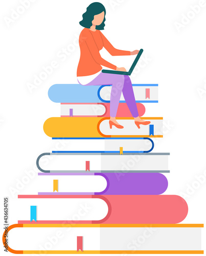 Young woman sitting on pile of books and using her laptop. E-learning, webinar, online video training, distance working concept. Female freelancer performing task and doing work with technology