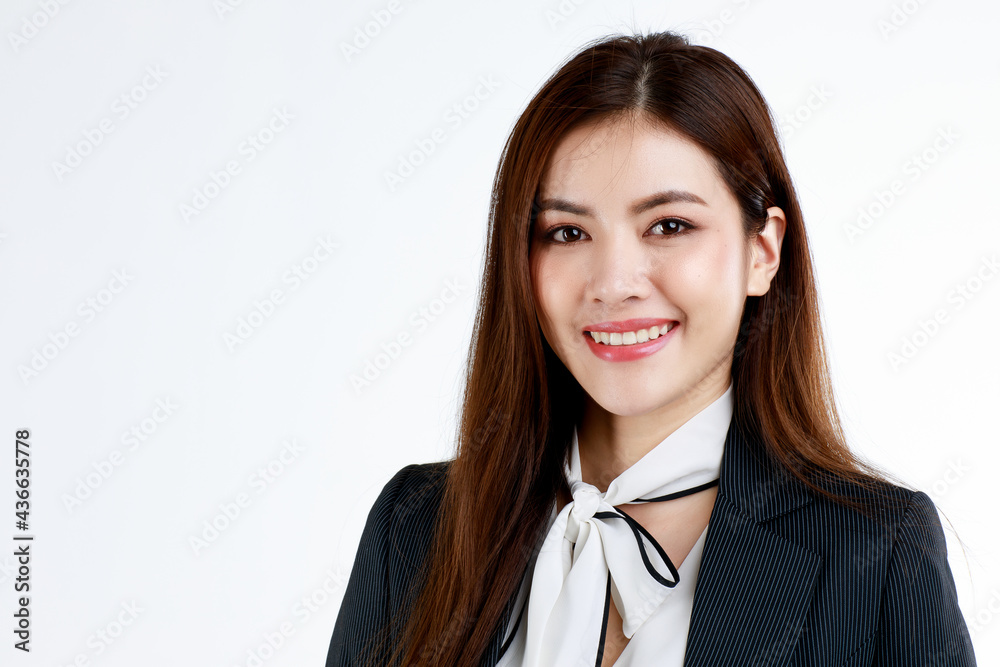 Portrait of young Asian businesswoman in formal black suit dress posing with gorgeous and elegant style in friendly and self-confidence gesture, studio shot on white background Portrait of young Asian businesswoman in formal black suit dress posing with gorgeous and elegant style in friendly and self-confidence gesture, studio shot on white background