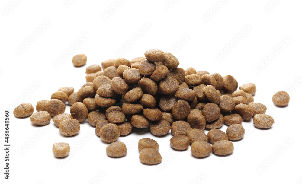 Dog food pile, dry granules for puppies and young dogs isolated on white background Dog food pile, dry granules for puppies and young dogs isolated on white background