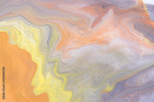 Abstract fluid art background light orange and gray colors. Liquid marble. Acrylic painting with yellow gradient.