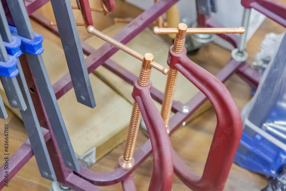 Mechanical working tool in a carpentry workshop. Manual production of wood and precious woods products Mechanical working tool in a carpentry workshop. Manual production of wood and precious woods products