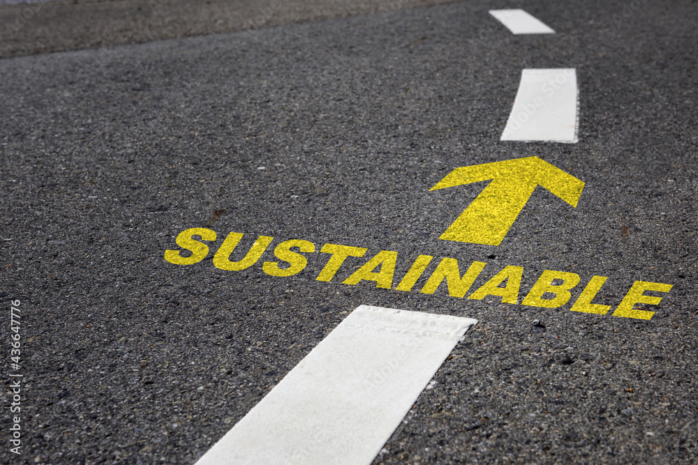Future ahead to success concept and challenge with growth mindset idea. Sustainable word and arrow marking on asphalt road surface with marking lines Future ahead to success concept and challenge with growth mindset idea. Sustainable word and arrow marking on asphalt road surface with marking lines