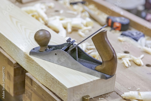 Mechanical working tool in a carpentry workshop. Manual production of wood and precious woods products