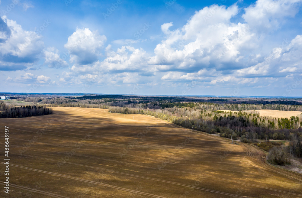 Aerial view of agricultural landscape with fields in spring season. Aerial view of agricultural landscape with fields in spring season.