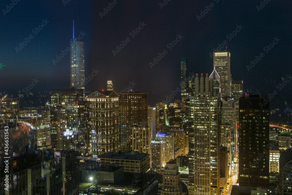 Partial Chicago skyline at night with clear sky