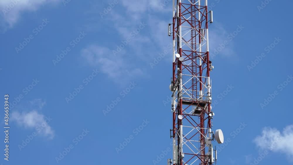 Time Lapse of Moving Clouds on Blue Sky Behind the Telecommunication Tower - Wireless Communication Technology Time Lapse of Moving Clouds on Blue Sky Behind the Telecommunication Tower - Wireless Communication Technology