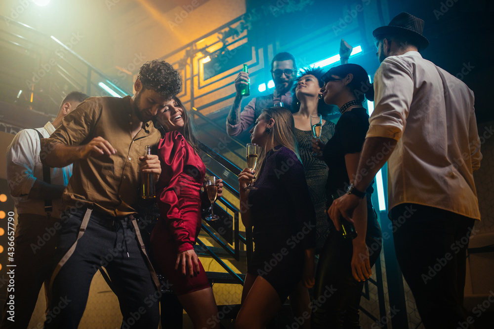 Fototapeta premium Shake off the week's worries on the dance floor