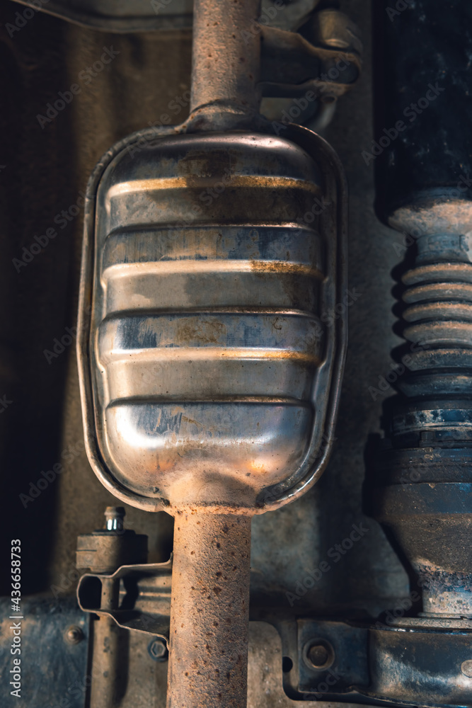 Vehicle underbody exhaust pipe, catalyst, resonator, exhaust system