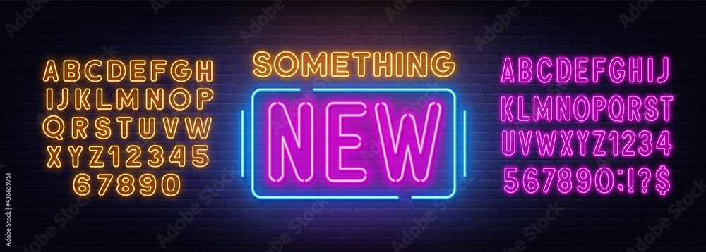 Naklejka premium Something new neon sign on brick wall background.