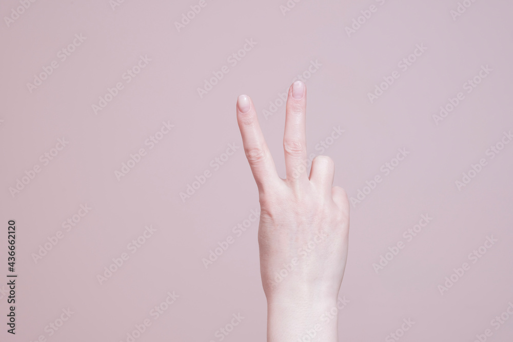 hand showing two fingers