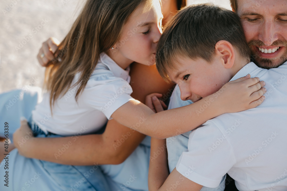 Close up view of happy family hugging. Concept of harmony family.