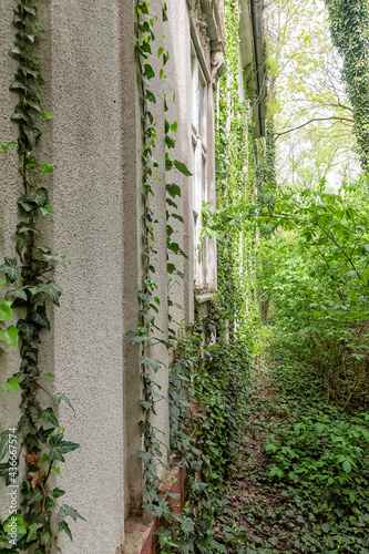 Becej, Serbia - May 01, 2021: The summer house of the noble family Gombos left to the ravages of time. It was built at the beginning of the 20th century photo