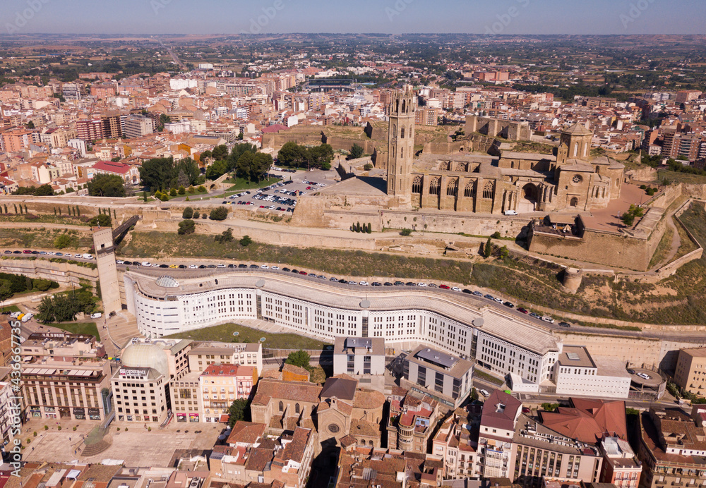 View from drone of Catalan city of Lleida with medieval Cathedral of St. Mary of La Seu Vella ..
