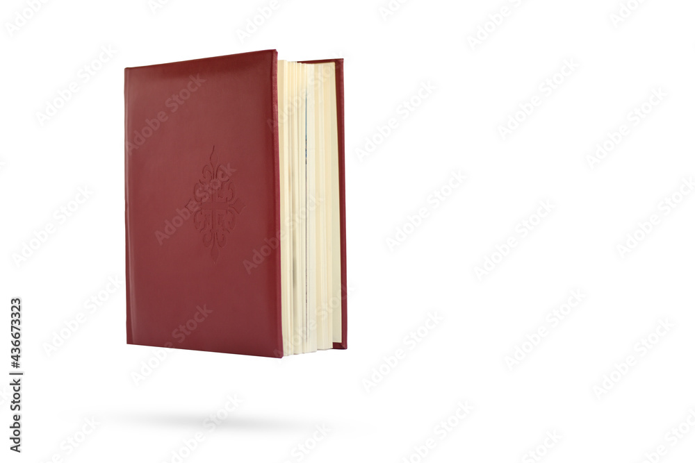 Red book isolated on white background. Levitation. Red book isolated on white background. Levitation.