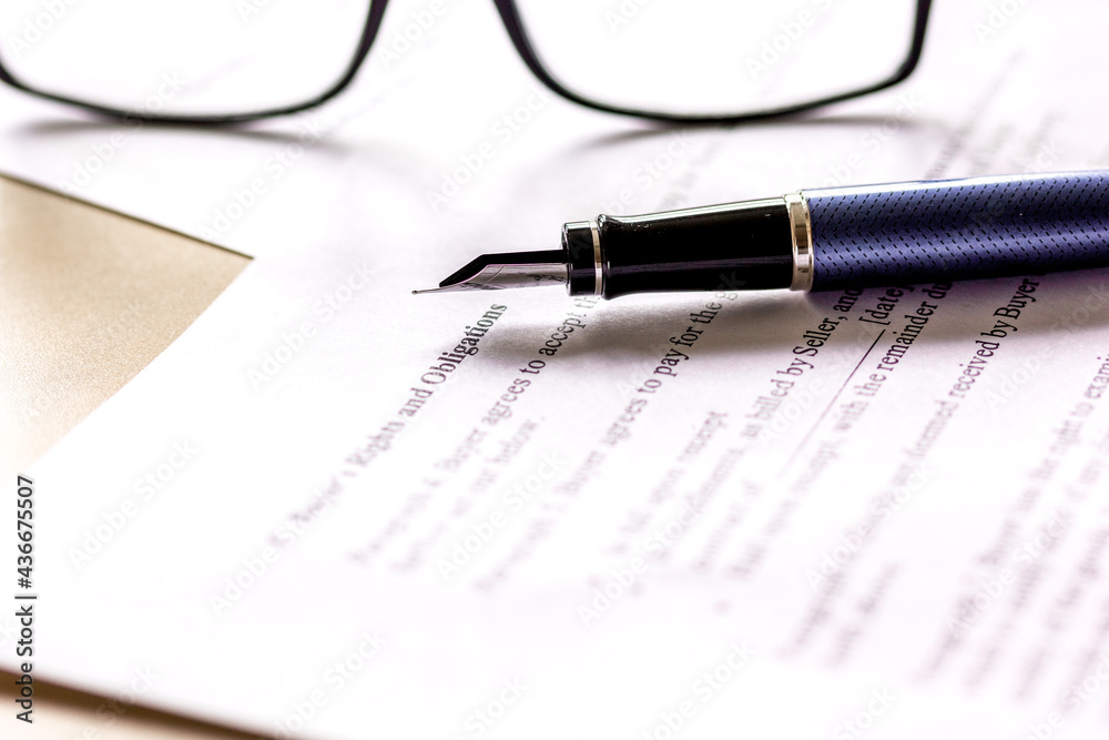 workspace with document, glasses and pen for sign for businessman day workspace with document, glasses and pen for sign for businessman day