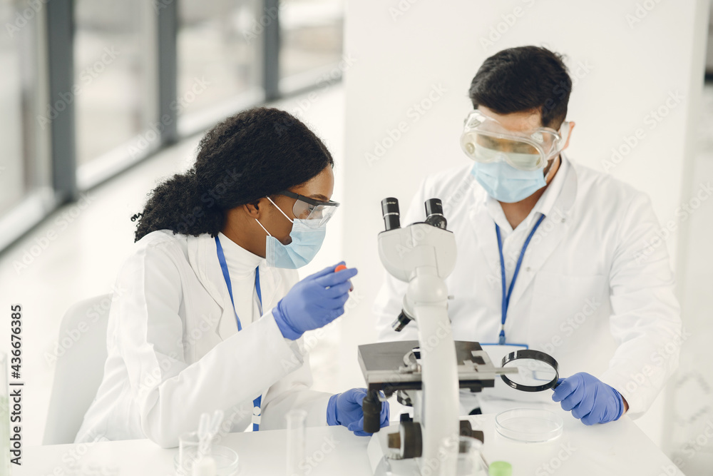 Researchers creating vaccine for covid-19 in a lab Researchers creating vaccine for covid-19 in a lab