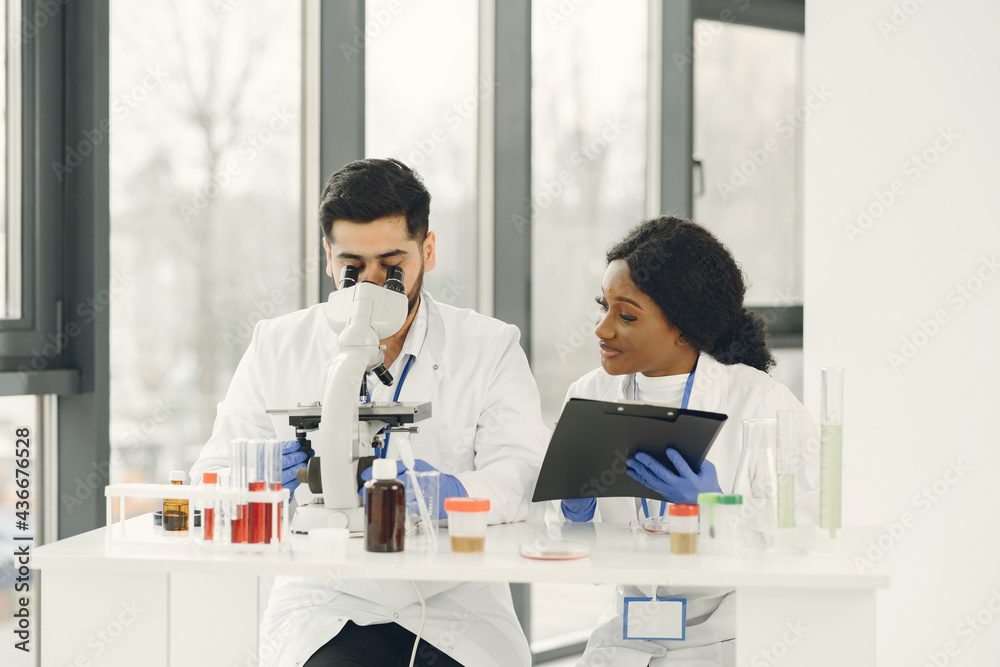 Researchers creating vaccine for covid-19 in a lab Researchers creating vaccine for covid-19 in a lab