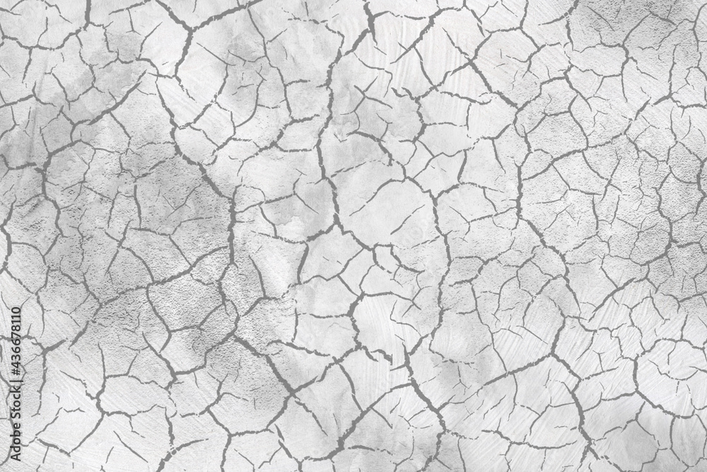 Abstract cracked background, monochrome texture, image including the effect of the black and white tones.
