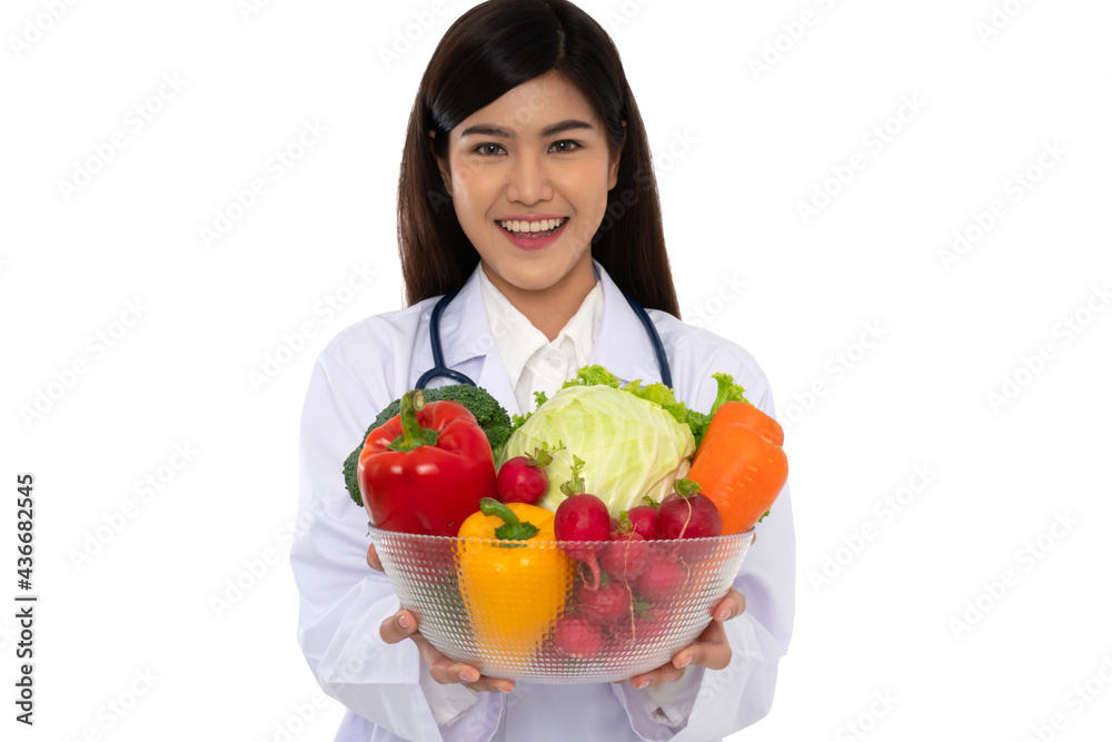 Doctor or nutritionist holding fresh fruit (Orange, red and green apples) and smile in clinic. Healthy diet Concept of nutrition food as a prescription for good health, fruit is medicine Doctor or nutritionist holding fresh fruit (Orange, red and green apples) and smile in clinic. Healthy diet Concept of nutrition food as a prescription for good health, fruit is medicine