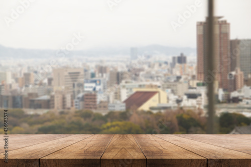 3D rendering, wooden top table on isolate blur scenery background © Chatya
