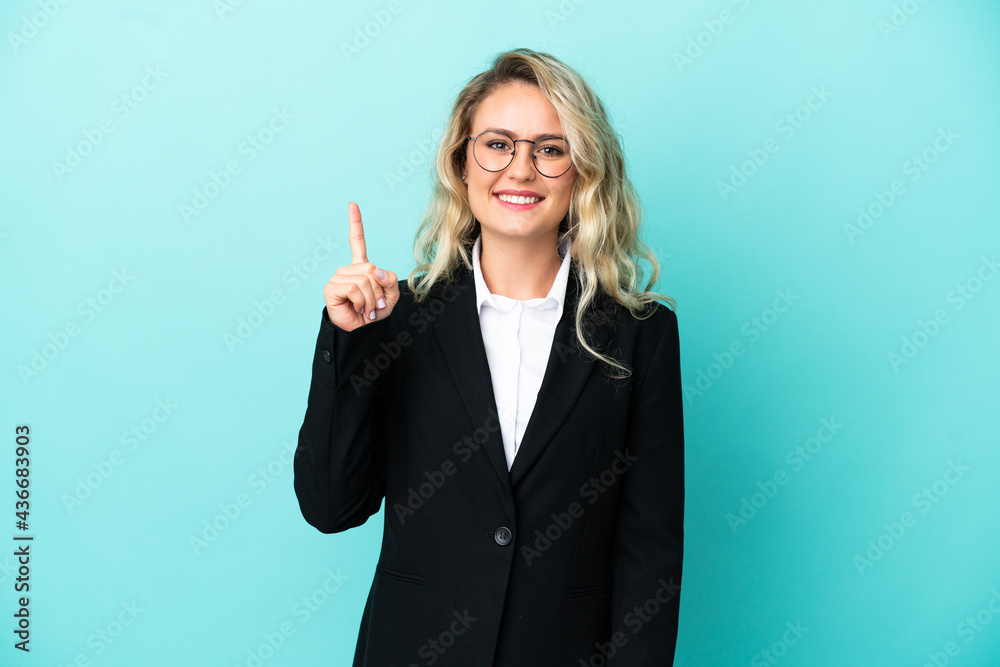 Brazilian business woman over isolated background pointing up a great idea Brazilian business woman over isolated background pointing up a great idea