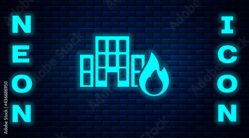 Glowing neon Fire in burning buildings on city street icon isolated on brick wall background. Destroyed city on fire. Vector
