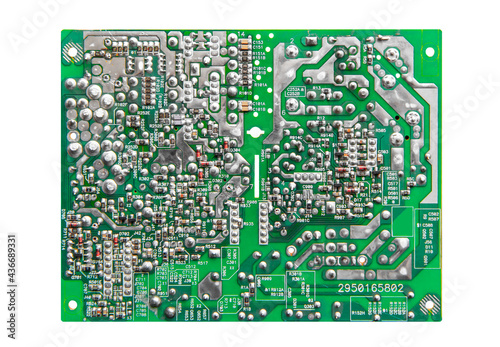 Electronic printed circuit board with soldered contacts on the reverse side of the parts. Isolated on white background