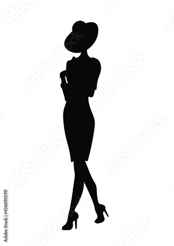 Pretty woman in dress and hat silhouette