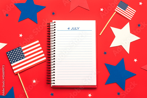 Independence day July 4th.Top view of agenda with the text July 4th and with copy space.with american flags and stars