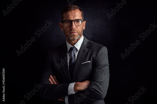 Middle aged businessman studio portrait