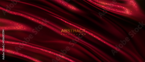 Dark red wavy textile with golden glitters pattern
