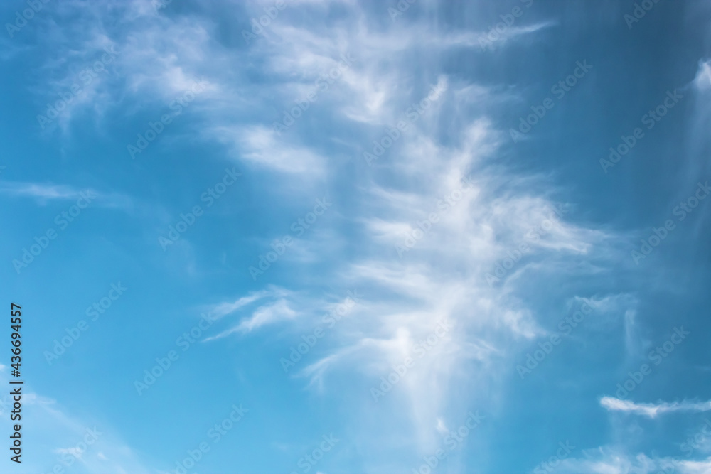 Clouds in the blue sky on a bright cloudy day Clouds in the blue sky on a bright cloudy day