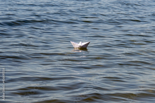 A paper boat floats on the Akakul lake of the Chelyabinsk region