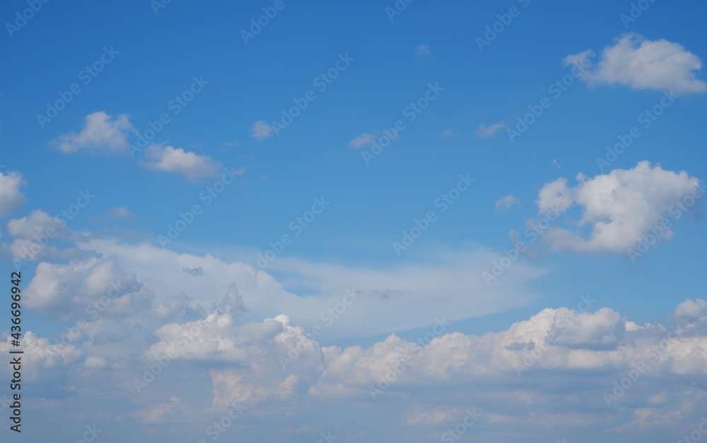 Blue sky and white clouds on natural daylight background Blue sky and white clouds on natural daylight background