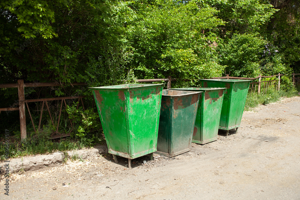 Trash bins on the street waiting to be collected Trash bins on the street waiting to be collected