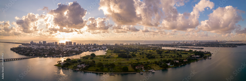 Beautiful sunrise over Miami aerial panorama facing east towards ocean