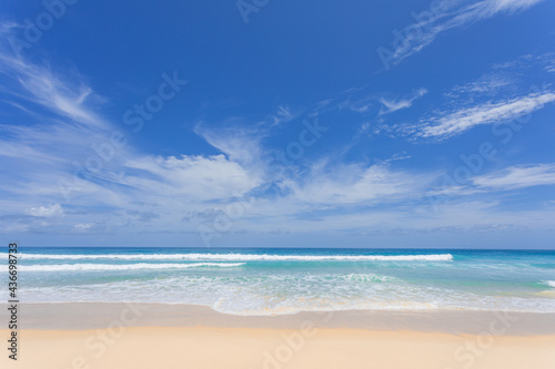 Sea sand beach background Summer beach with sunny sky and coconut tree Phuket island, Thailand Beautiful scene of blue sky and cloud on sunny day Empty holiday sea where the horizon can see clearly