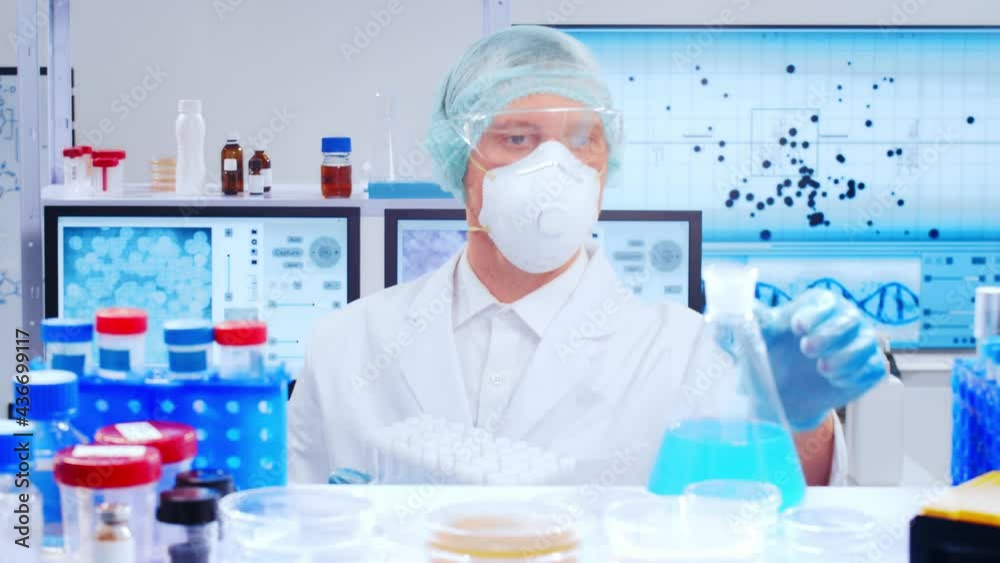 Professional scientist is working on a vaccine in a modern scientific research laboratory. Genetic engineer workplace. Future technology and science. Professional scientist is working on a vaccine in a modern scientific research laboratory. Genetic engineer workplace. Future technology and science.