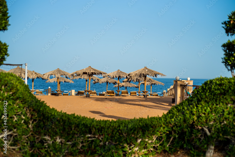 Tropical resort with umbrellas relax area Tropical resort with umbrellas relax area
