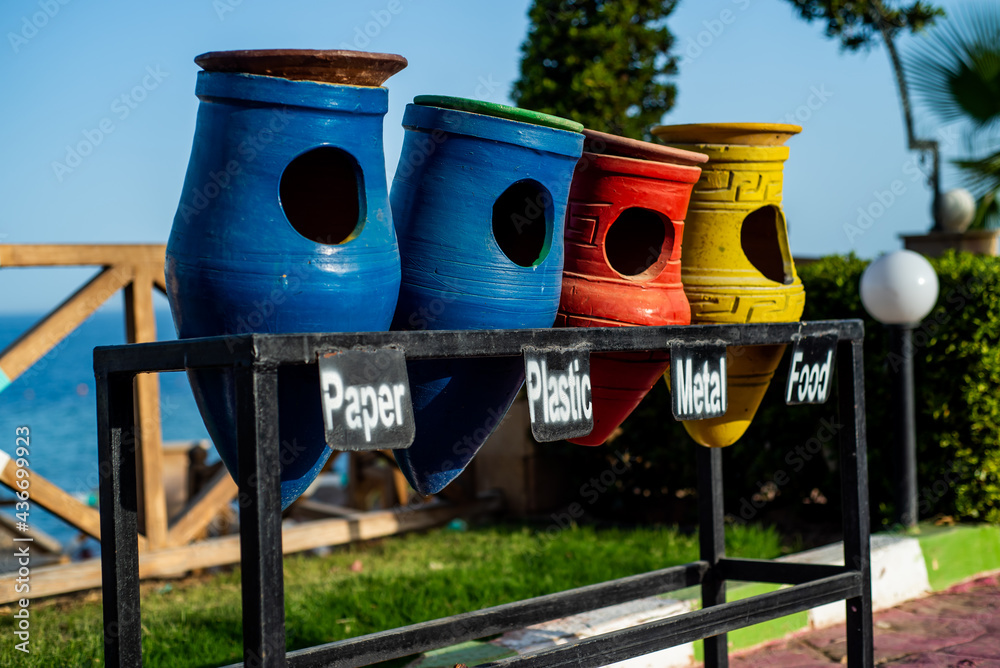Containers for sorting garbage in the form of jugs Stock Photo | Adobe ...