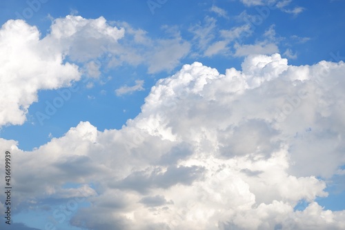 White clouds in bright sky on natural background.