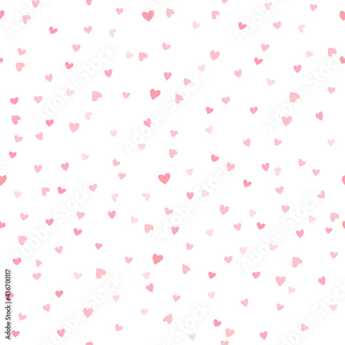 Vector seamless pattern with little hearts. Creative Valentine's Day confetti background. Pink neutral hearty backdrop for wrapping paper, textile, fabric, card making.