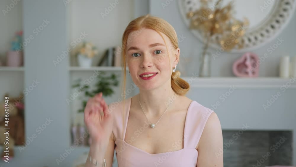 Portrait of Happy Smiling Redhead Girl Looking at Camera Like In a Mirror and Touching Her Skin. Real People Human Face and Natural Make Up Skin Care Concept. Portrait of Happy Smiling Redhead Girl Looking at Camera Like In a Mirror and Touching Her Skin. Real People Human Face and Natural Make Up Skin Care Concept.