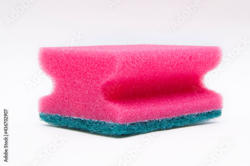 Pink sponges for washing dishes isolated