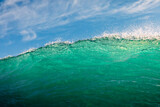 Ideal breaking wave in sea. Turquoise wave sunny day