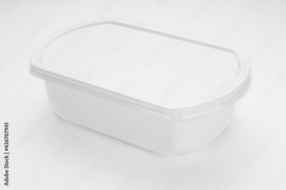 Disposable plastic food container close up on white background Disposable plastic food container close up on white background
