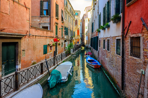 Narrow canal with bridge in Venice, Italy. Architecture and landmark of Venice. Cozy cityscape of Venice. © Ekaterina Belova