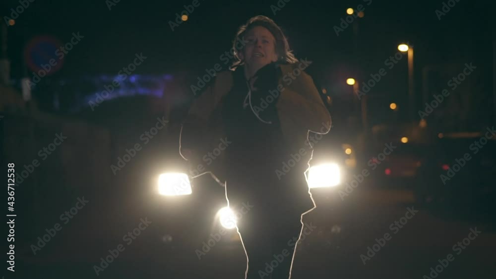 Young Model Tracked by a Car on a Night Covered By the Night Sky